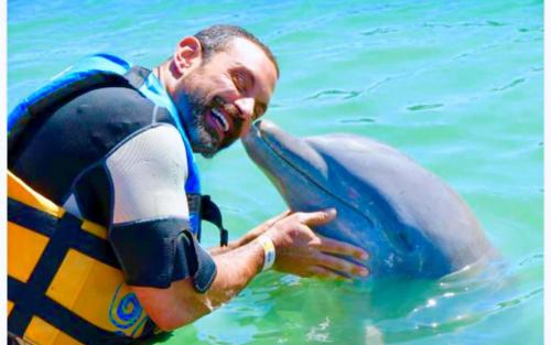 Swimming with dolphins has provento be very therapeutic